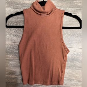 Camel colored sleeveless turtleneck